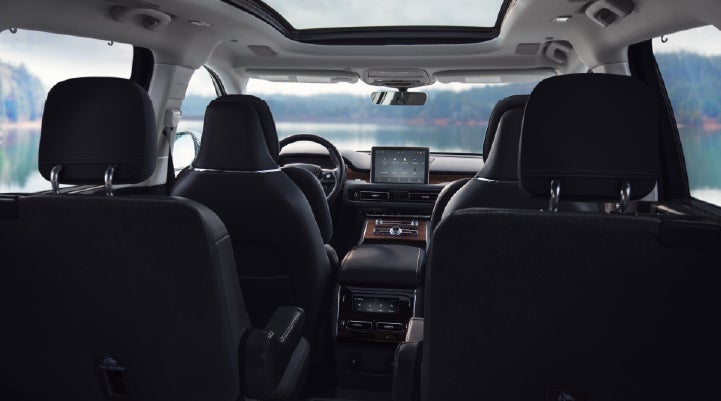 The interior of a 2024 Lincoln Aviator® SUV from behind the second row | Varsity Lincoln in Novi MI