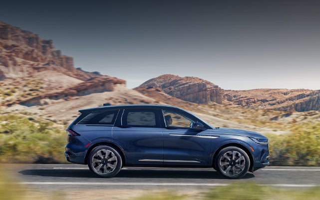 A 2024 Lincoln Nautilus® SUV is being driven in a desert setting. | Varsity Lincoln in Novi MI