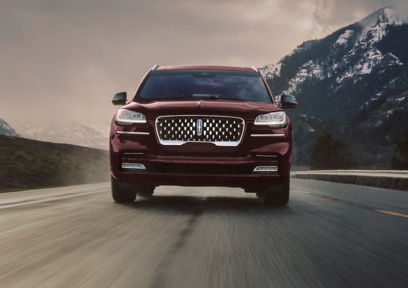 A 2024 Lincoln Aviator® SUV is shown in the Diamond Red exterior color. | Varsity Lincoln in Novi MI
