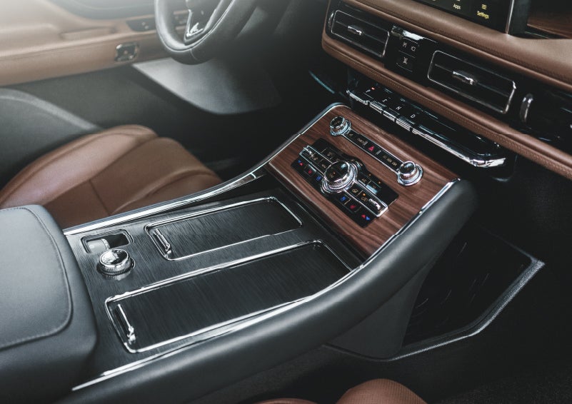 The front center console of a 2024 Lincoln Aviator® SUV is shown | Varsity Lincoln in Novi MI
