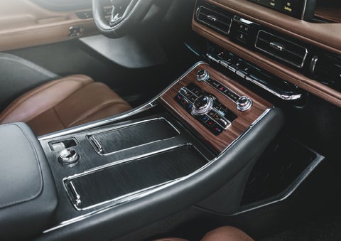 The front center console of a 2024 Lincoln Aviator® SUV is shown | Varsity Lincoln in Novi MI