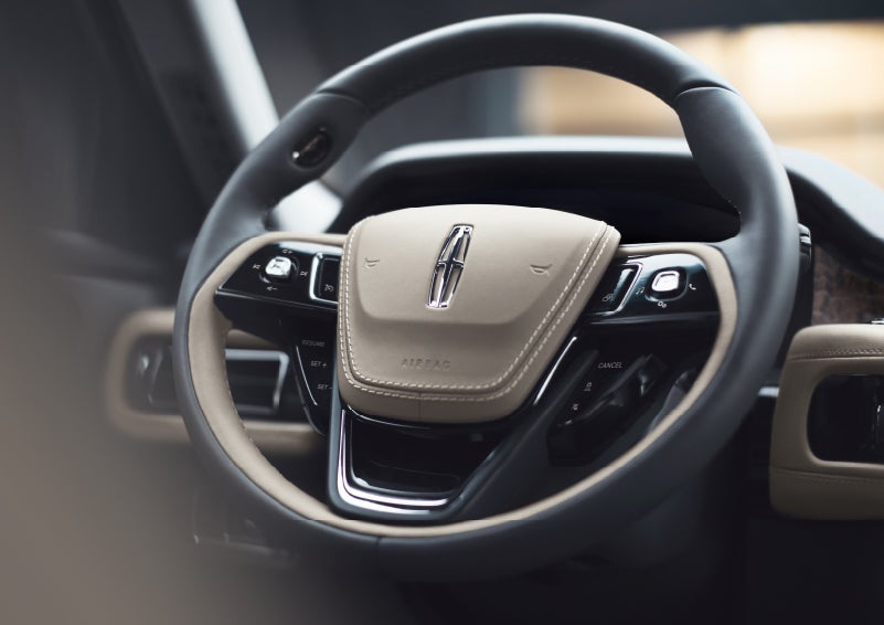 The intuitively placed controls of the steering wheel on a 2024 Lincoln Aviator® SUV | Varsity Lincoln in Novi MI