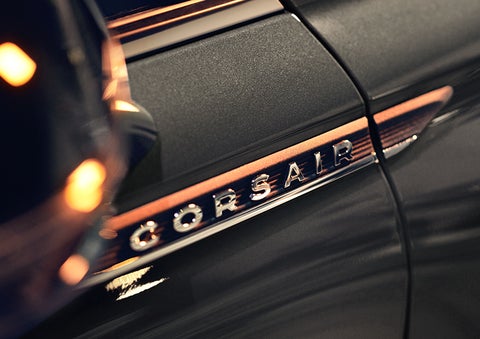 The stylish chrome badge reading “CORSAIR” is shown on the exterior of the vehicle. | Varsity Lincoln in Novi MI