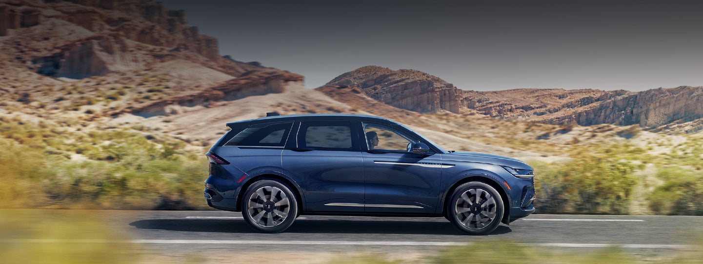 A 2024 Lincoln Nautilus® SUV is being driven in a desert setting. | Varsity Lincoln in Novi MI