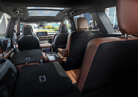 The interior of the 2025 Lincoln Aviator® SUV is shown with two seats folded down for added space. | Varsity Lincoln in Novi MI