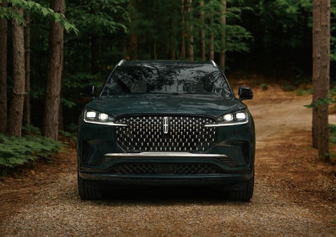 The front grille of a 2027 Lincoln Aviator® Black Label™ SUV is shown. | Varsity Lincoln in Novi MI