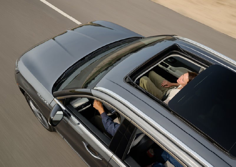 The available panoramic Vista Roof® of a 2027 Lincoln Aviator® SUV is open. | Varsity Lincoln in Novi MI