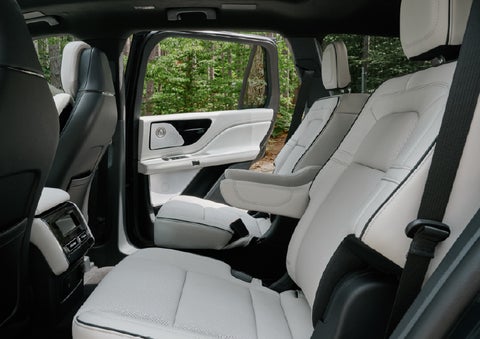 A side view of the second row with captain’s chairs in a 2027 Lincoln Aviator® Black Label™ SUV. | Varsity Lincoln in Novi MI